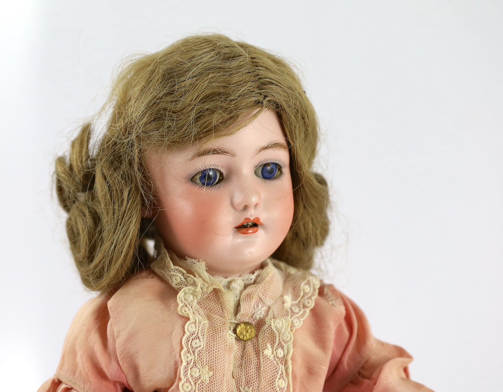 A Simon & Halbig S. & C. bisque doll, German, circa 1895, 17in.